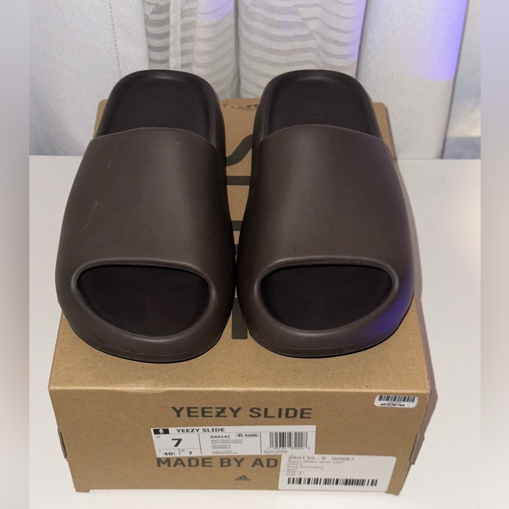 Yeezy Slides! Size 7 men. Runs small! Gently used.
